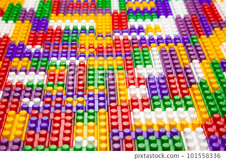 Abstract background texture of colored constructor blocks. 101558336
