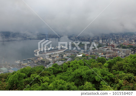 Nagasaki Port and a large cruise ship shrouded in fog 101558407