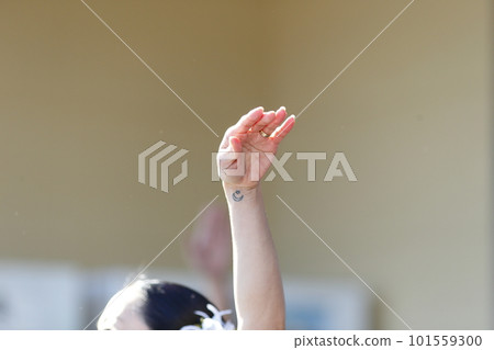 Woman's hand dancing hula 101559300