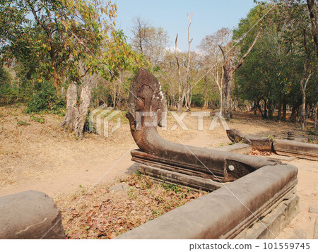 The road to Beng Mealea Ruins Behind the Snake God Statue The road to Beng Mealea Ruins Behind the Snake God Statue 101559745