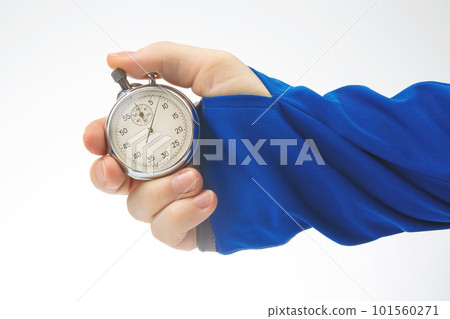 hand with a mechanical analog stopwatch on a white background 101560271