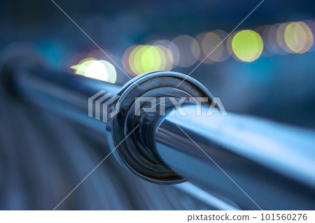handrail railing made of stainless material close-up near the river embankment 101560276