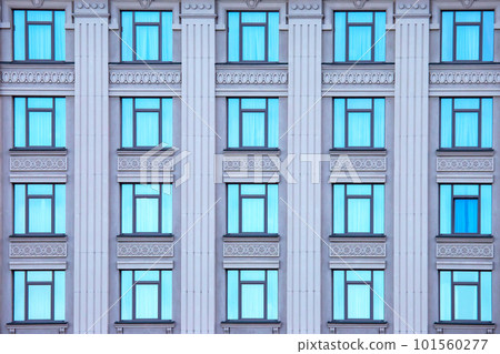 building facade with windows. residential building industry in the city 101560277