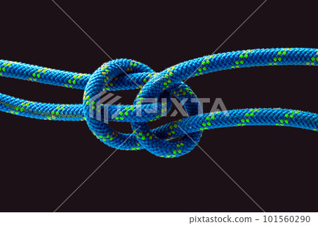 durable colored rope for climbing equipment on a dark background. 101560290
