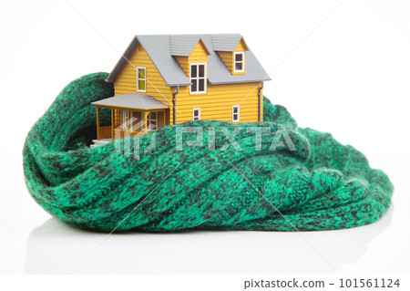 house model is insulated with a knitted scarf on a white background 101561124
