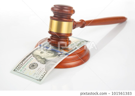 gavel of justice on the background of dollars. corruption in law. buying a judgment gavel of justice on the background of dollars. corruption in law. buying a judgment 101561383