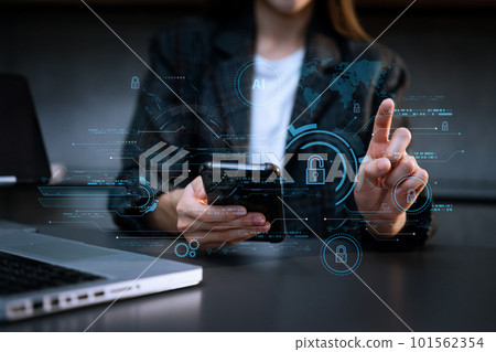 Cyber security and data protection. Business using computer and  tablet protecting business and financial data with virtual from cyber attack, cybersecurity technology in office 101562354