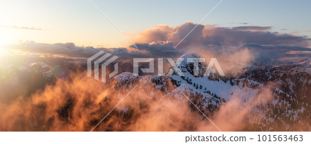 Coastal Canadian Mountain Landscape covered in Snow. Aerial View Background 101563463