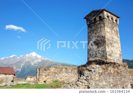 View of a village with old Svan towers in Georgia. travel in the mountains View of a village with old Svan towers in Georgia. travel in the mountains 101564134