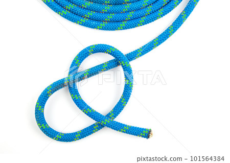 durable colored rope for climbing equipment on a white background. durable colored rope for climbing equipment on a white background. 101564384