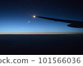 A sunset glow seen from an airplane 101566036