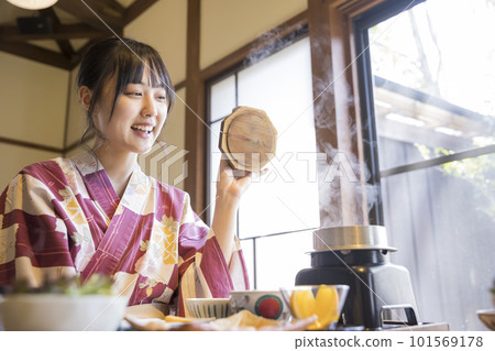 Ryokan breakfast image Woman enjoying a hot spring trip Ryokan breakfast image Woman enjoying a hot spring trip 101569178