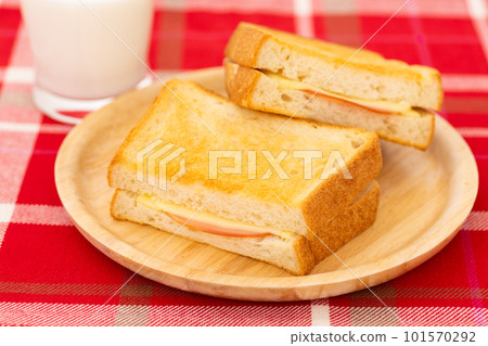 Ham cheese toast sandwich and milk 101570292