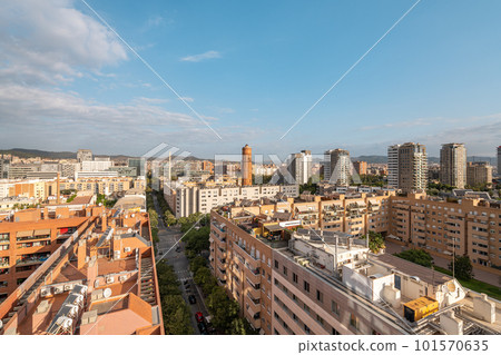 Aerial view of the mesmerizing area of Poble Nou in Barcelona in Spain near the sea with highly developed infrastructure on a sunny warm summer day. Copyspace Aerial view of the mesmerizing area of Poble Nou in Barcelona in Spain near the sea with highly developed infrastructure on a sunny warm summer day. Copyspace 101570635