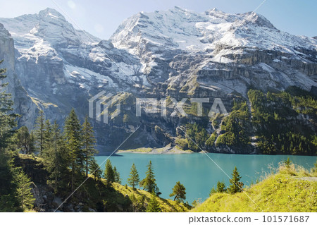 Morning view of lake Oeschinensee. Swiss alps, Switzerland. 101571687
