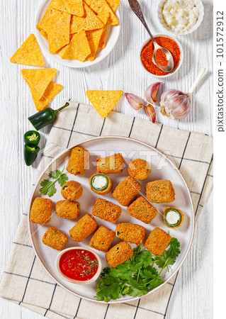 breaded crispy fried jalapeno poppers, top view 101572912