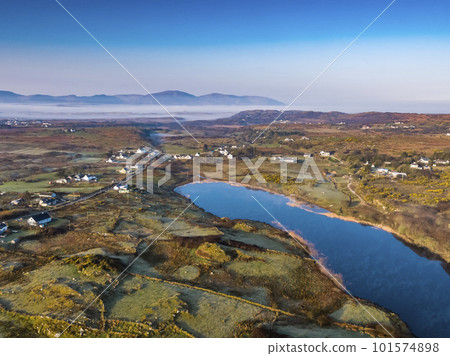 Aerial view of Lough fad in the morning fog, County Donegal, Republic of Ireland 101574898