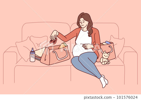 Pregnant woman is packing things for unborn child in bag going to maternity hospital Pregnant woman is packing things for unborn child in bag going to maternity hospital 101576024