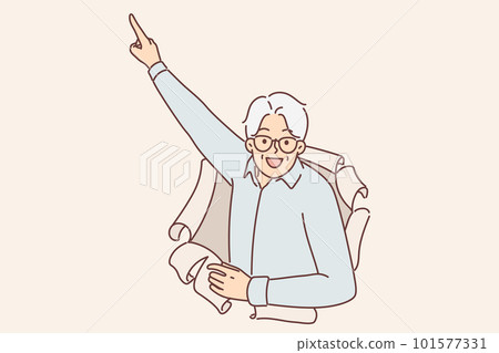 Elderly man peeks out of hole in paper and points finger upwards, paying attention to promo offers 101577331