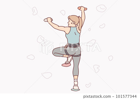 Woman climber is training to swarm up artificial stone wall, wanting to conquer new peak Woman climber is training to swarm up artificial stone wall, wanting to conquer new peak 101577344