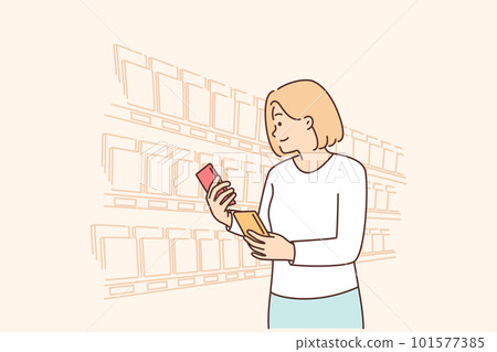 Woman looking for sweet chocolate on grocery store shelves choosing low calorie breakfast dessert Woman looking for sweet chocolate on grocery store shelves choosing low calorie breakfast dessert 101577385