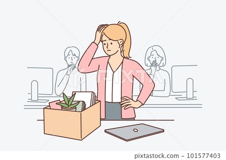 Upset woman standing near table with box after dismissal of manager or secretary position Upset woman standing near table with box after dismissal of manager or secretary position 101577403