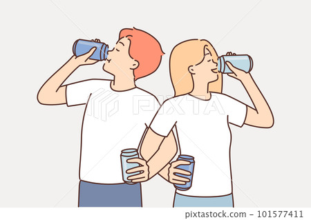 Couple of man and woman cross their arms drinking soda competing in speed of using soft drink Couple of man and woman cross their arms drinking soda competing in speed of using soft drink 101577411