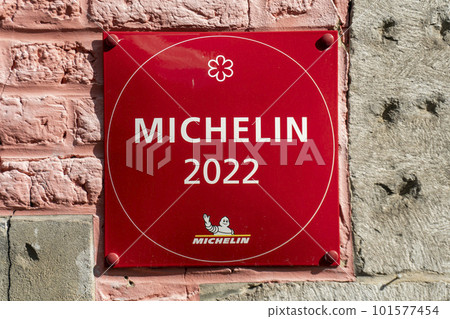 Reims, France - 15 October 2022 : Michelin restaurant 2022 logo sign and text brand of red guide book for good place Reims, France - 15 October 2022 : Michelin restaurant 2022 logo sign and text brand of red guide book for good place 101577454