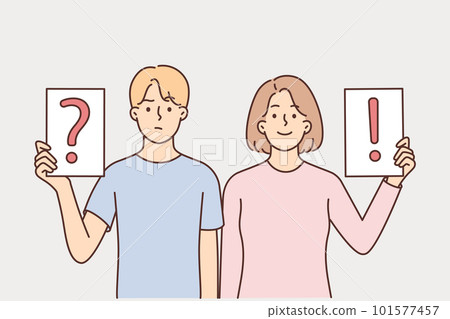Man and woman showing signs with question and exclamation marks for concept of disagreement Man and woman showing signs with question and exclamation marks for concept of disagreement 101577457