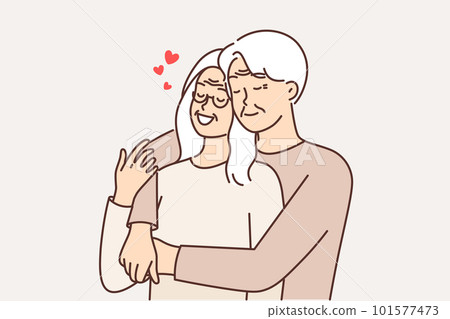 Elderly couple in love from gray-haired man and woman hugging and remembering youth or first date 101577473