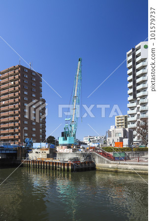 Nomikawa Shinbashi bridge under construction by a large crane Nomikawa Shinbashi bridge under construction by a large crane 101579737