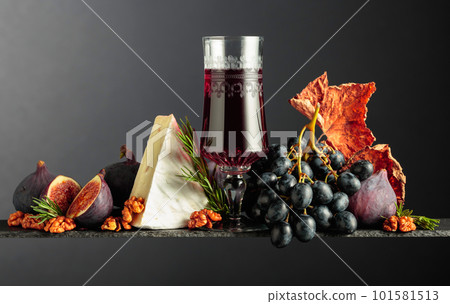 Red wine with cheese brie and fruits. Red wine with cheese brie and fruits. 101581513