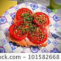 Smoked salmon fillet with tomato slices on bread at plate. High quality photo 101582668