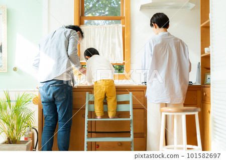 3 year old boy helping with cooking 3 year old boy helping with cooking 101582697