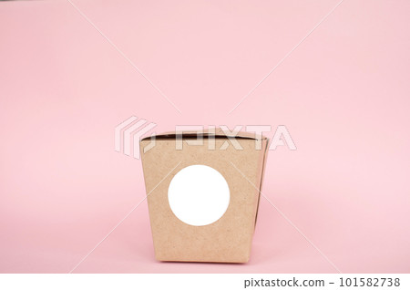 Round sticker mockup on kraft box, lunchbox, packaging with blank sticker, adhesive label, food box Round sticker mockup on kraft box, lunchbox, packaging with blank sticker, adhesive label, food box 101582738