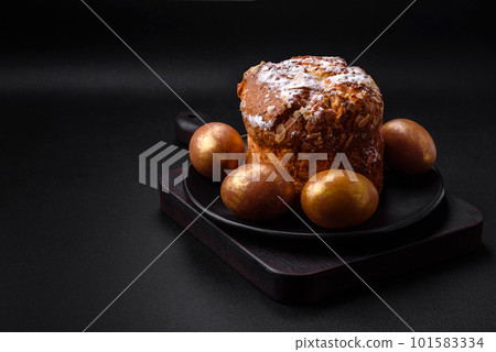 Delicious fresh Easter cake with fruits and raisins 101583334