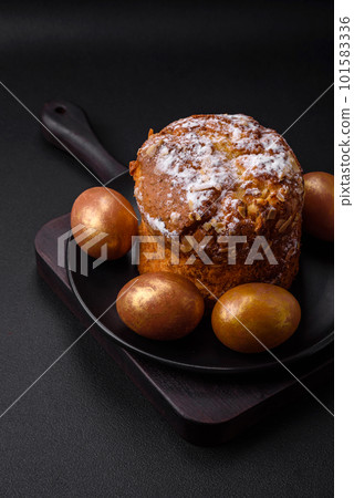 Delicious fresh Easter cake with fruits and raisins Delicious fresh Easter cake with fruits and raisins 101583336