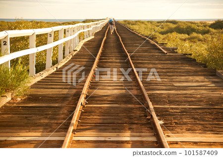 Freight tracks on a pier in Australia 101587409