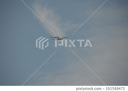 Airplane flying over the sky (Chofu City, Tokyo) 101588472
