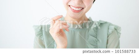 The mouth of a cute woman looking at you with a smile No face in the image of whitening or beauty The mouth of a cute woman looking at you with a smile No face in the image of whitening or beauty 101588733