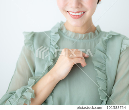 The mouth of a cute woman looking at you with a smile No face in the image of whitening or beauty The mouth of a cute woman looking at you with a smile No face in the image of whitening or beauty 101588734
