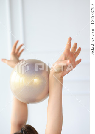 close-up of a gymnast's hands with a ball close-up of a gymnast's hands with a ball 101588799