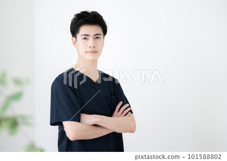Image of male care and nursing that is easy to use for osteopaths, caregivers, nurses, etc. Copy space with arms folded 101588802