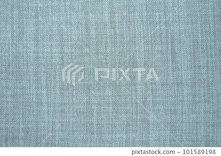 blue gray background fabric texture. A piece of woolen cloth is neatly laid out on the surface. Weave and textile texture. Dress fabric or for kitchen needs, tablecloth or curtains, close-up. Dash 101589198