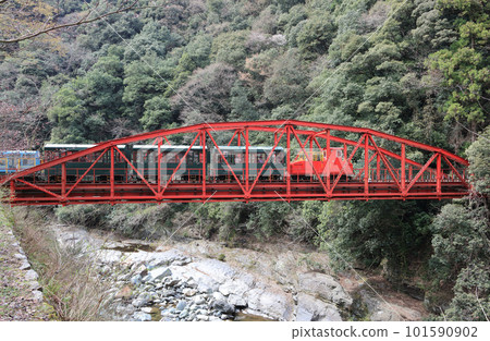 Mining sightseeing train at Minetopia Besshi crossing the Uchiyoke Tetsubashi Bridge on the Besshi Line 101590902
