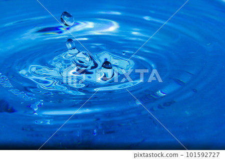 splashing blue water droplets splashing blue water droplets 101592727
