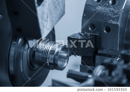 The multi-tasking CNC lathe machine swiss type finish cut the metal pipe parts. The multi-tasking CNC lathe machine swiss type finish cut the metal pipe parts. 101595503