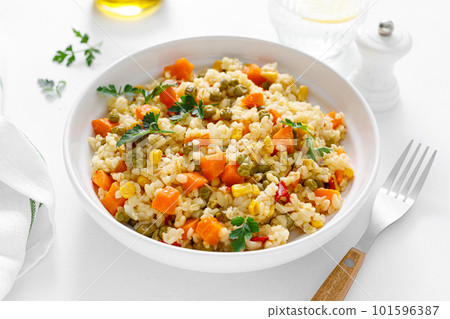 Bulgur with vegetables and fresh parsley 101596387