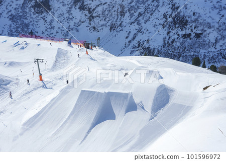 Tourists skiing on snow covered mountain with scenic during vacation, winter holiday travel concept Tourists skiing on snow covered mountain with scenic during vacation, winter holiday travel concept 101596972