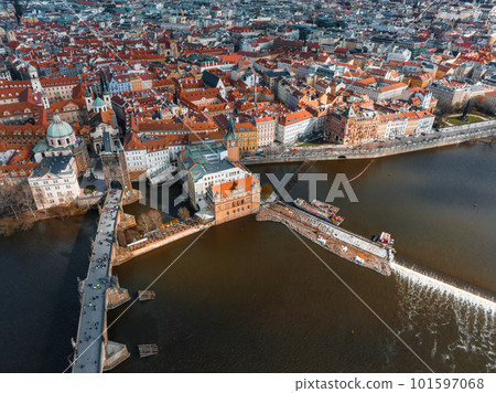 Scenic spring panoramic aerial view of the Old Town pier architecture and Charles Bridge over Vltava river in Prague, Czech Republic 101597068